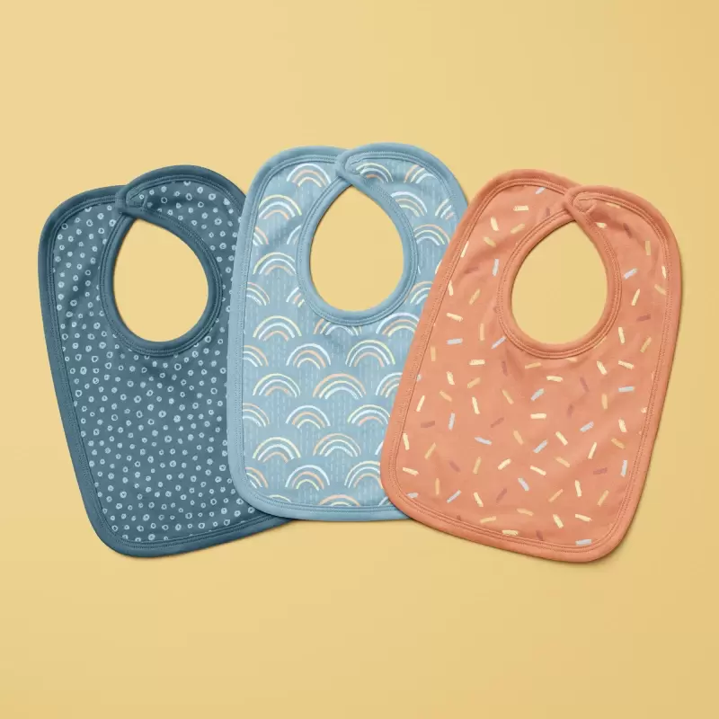 Bibs in dots, rainbow and sprinkles patterns