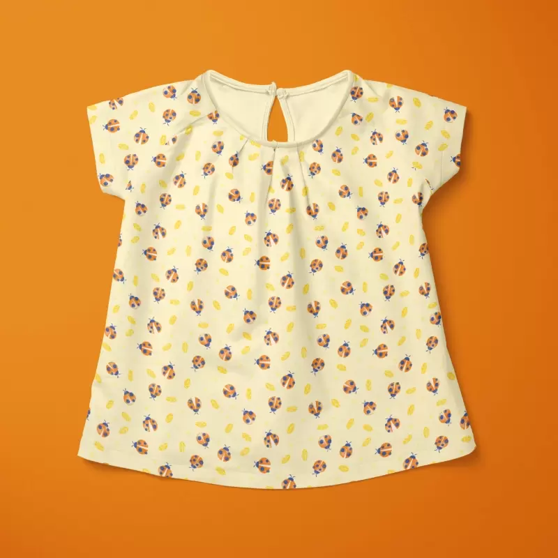 Ladybug summer blouse in pale yellow